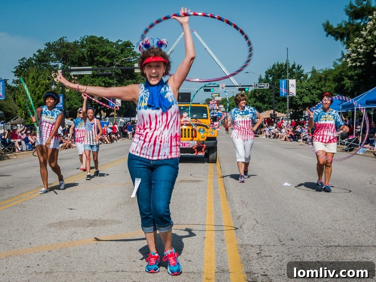 Arlington's Independence Day Parade: A Historic Blast of Sound and Patriotism 2 A vibrant parade float making its way through a sunny street during the Arlington Independence Day Parade, adorned with patriotic decorations.