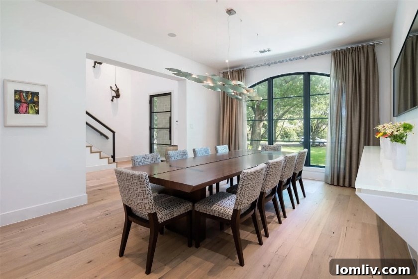 Preston Hollow's Transitional Pool Masterpiece 5 Spacious and bright dining area in the luxurious Dallas residence