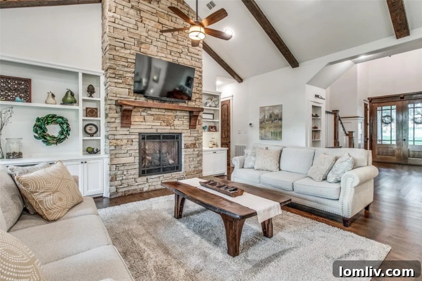 Spacious living area with high ceilings and elegant furnishings