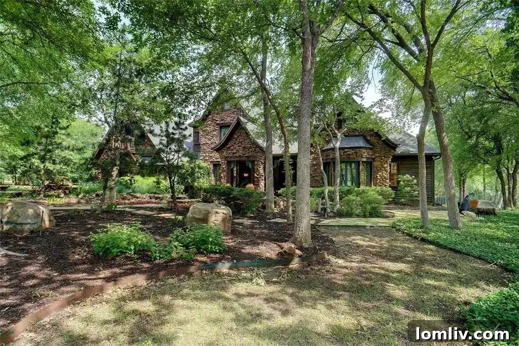Lush green landscaping surrounding the property with mature trees