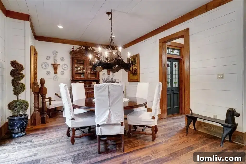 Elegant dining room with custom wood and wrought iron chandelier