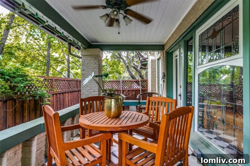 Gleaming hardwood floors and an inviting hallway in the historic Oak Lawn home