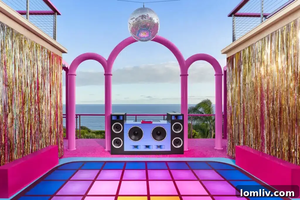 Exterior view of the Malibu Dreamhouse with a vibrant pink slide