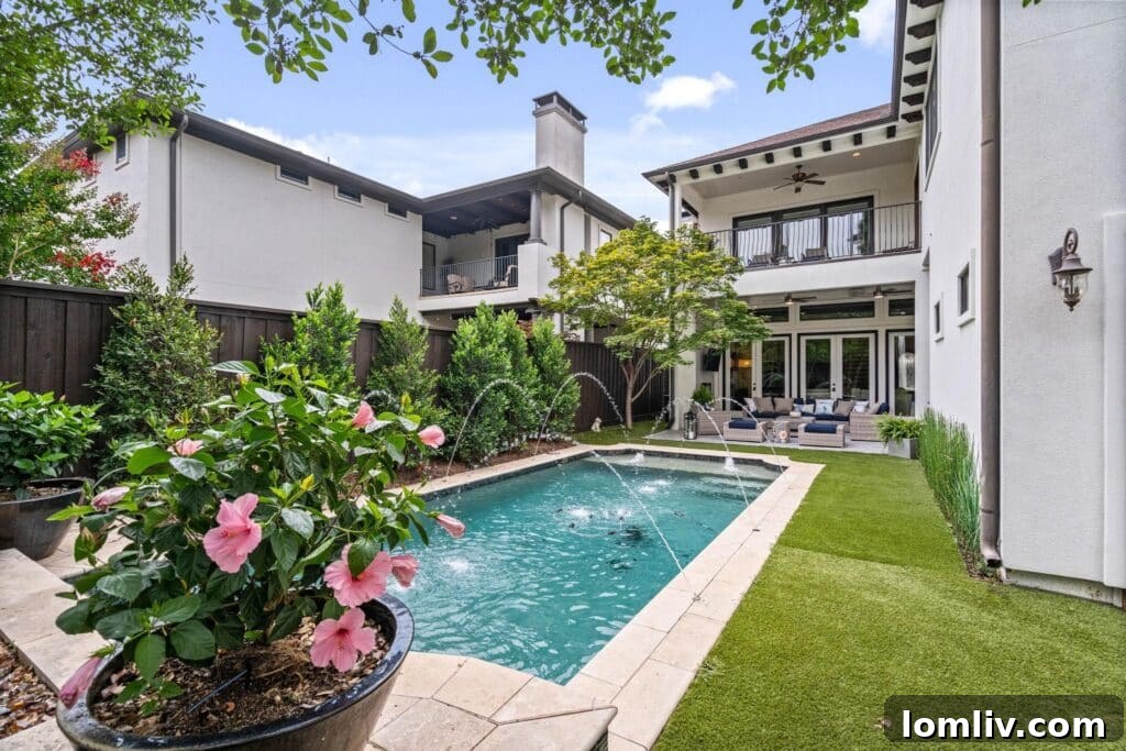 Cool Down: Your Next Home Awaits 3 A stunning Mediterranean-style home with elegant architecture and lush landscaping, hinting at cool interiors and sophisticated living.