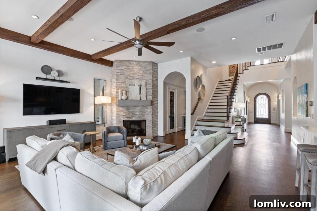 Cool Down: Your Next Home Awaits 5 The luxurious kitchen of 4911 Purdue Avenue, featuring high-end appliances, ample counter space, and sophisticated design, perfect for culinary endeavors.