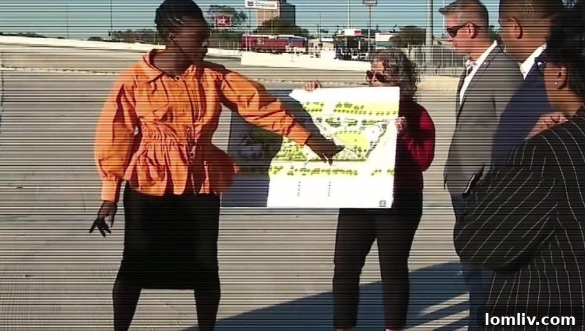 April Allen displaying plans for Southern Gateway Park