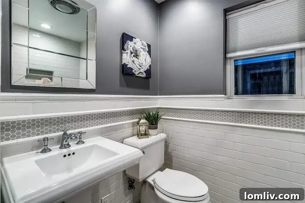 Detailed view of the primary ensuite bathroom's marble vanity and ample counter space