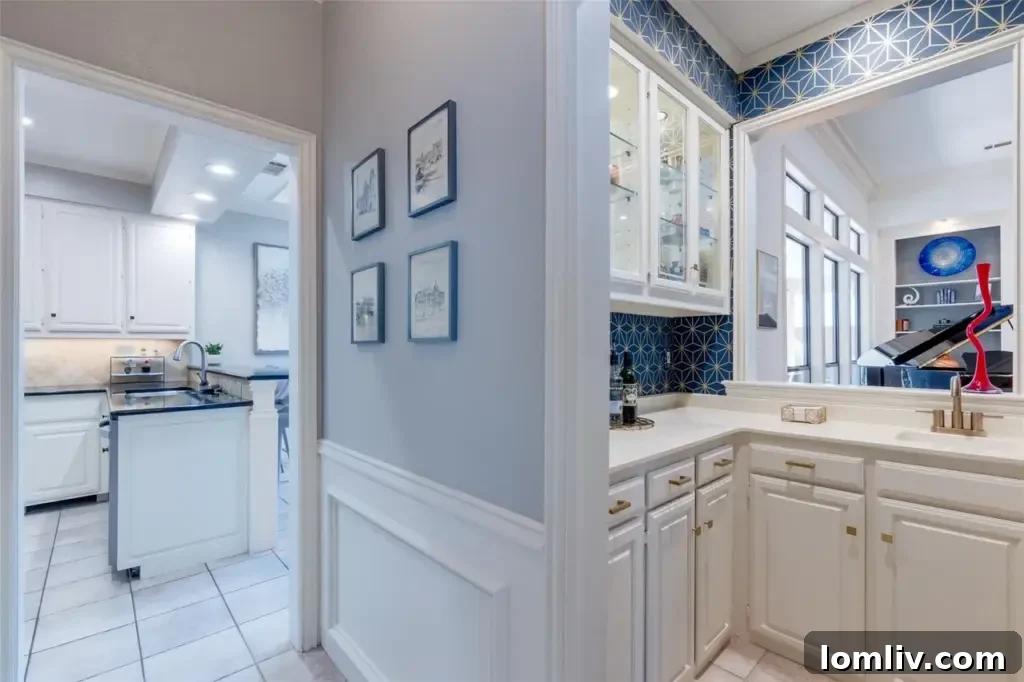 Modernized wet bar with geometric wallpaper