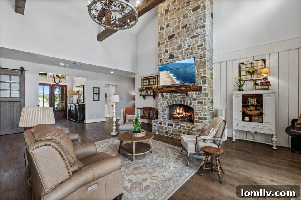 Eighteen-foot rock fireplace in the living room of this Royce City luxury home