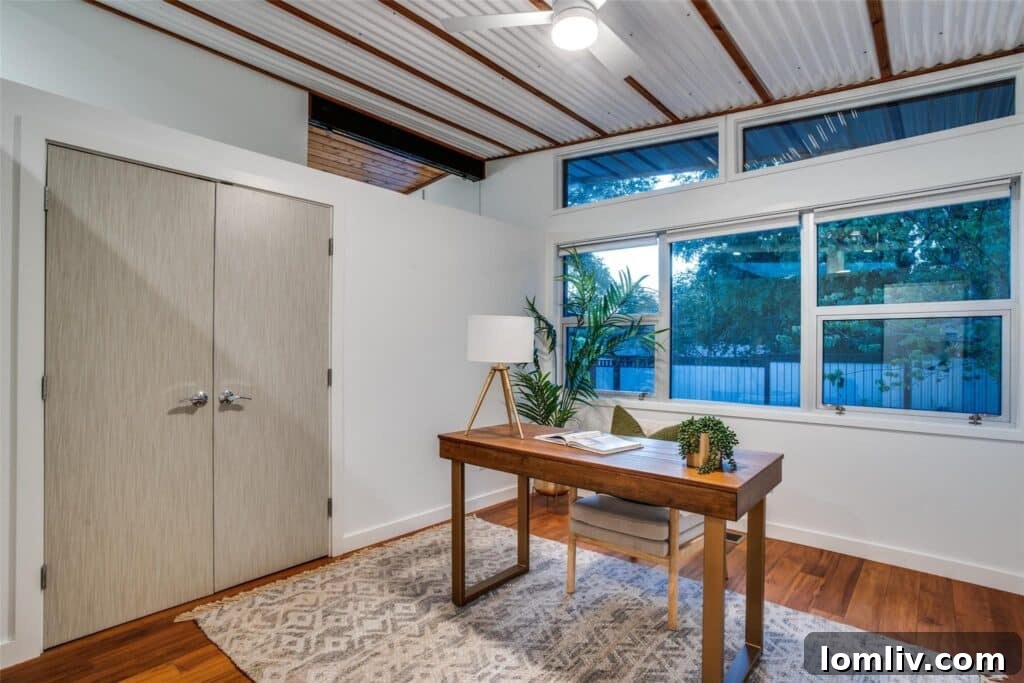 Luxurious primary bathroom with blue penny tile and woodgrain shower