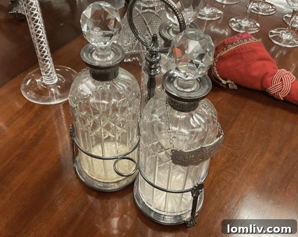 A display of sparkling cut crystal decanters with intricate designs at M.D. Antiques