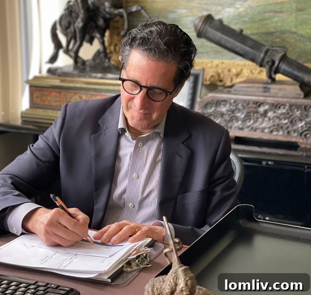 Joel Holiner and David Nevolo standing inside M.D. Antiques, surrounded by antique pieces
