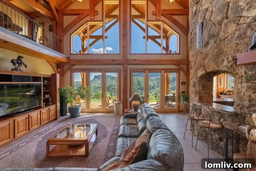 Expansive deck or patio area with outdoor seating and incredible mountain views.