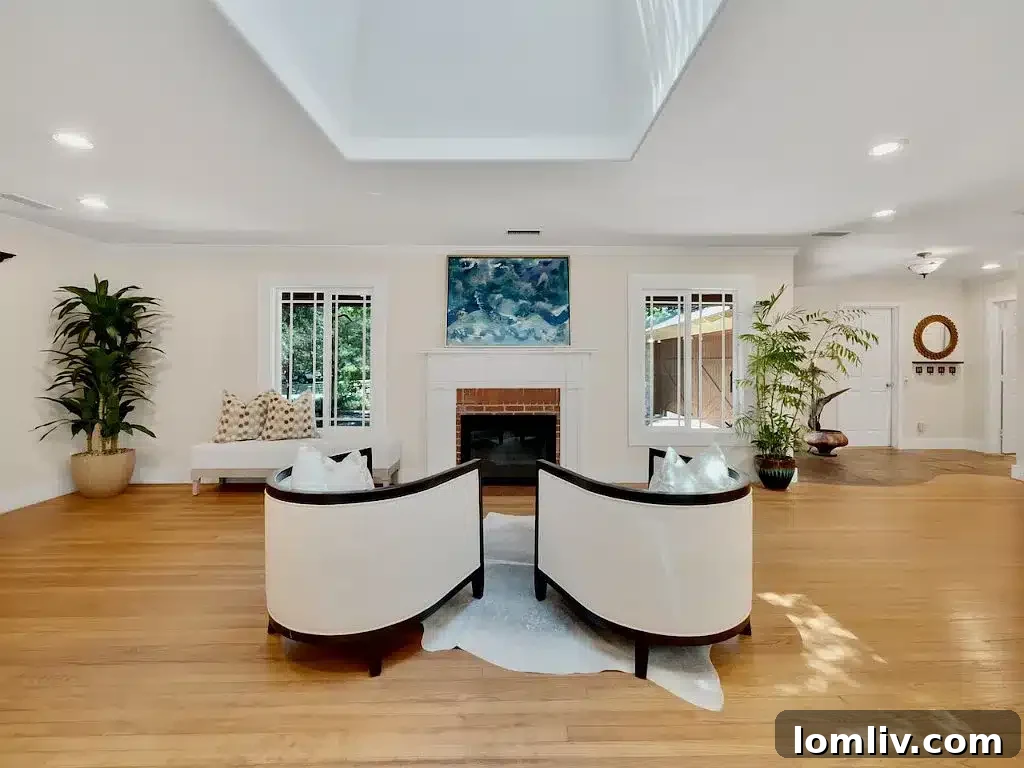 Charming remodeled home exterior from 1951, blending classic architecture with modern updates, set against a green lawn.