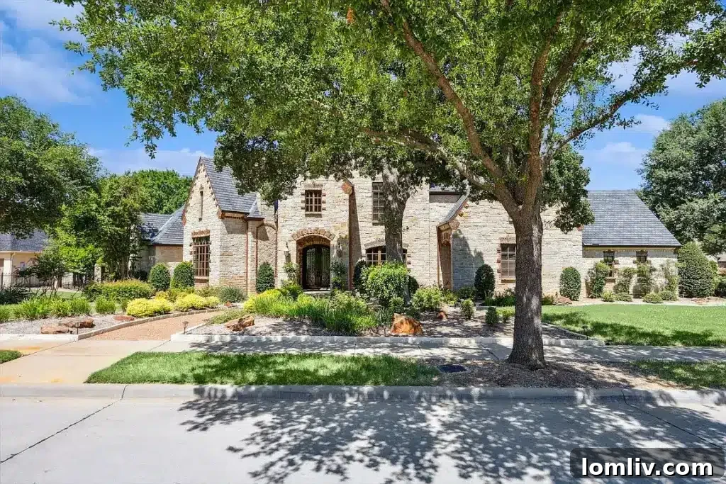 Luxurious Keller home on a large, landscaped lot, featuring elegant architecture and mature trees.