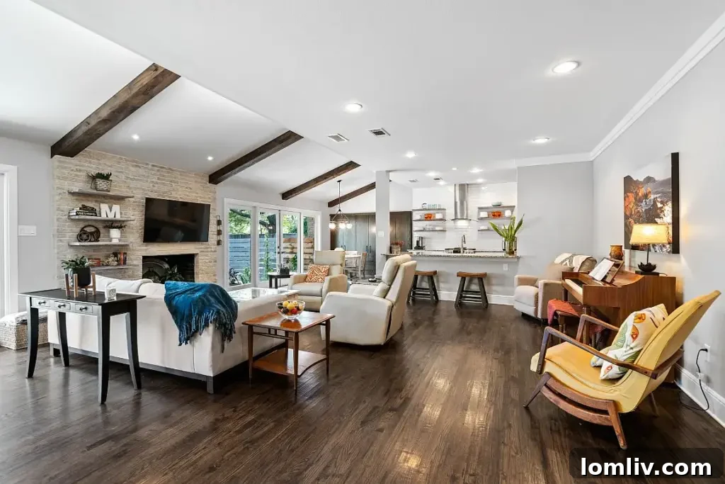Interior view of the living room at 3748 Waldorf Drive, featuring an open plan and fireplace