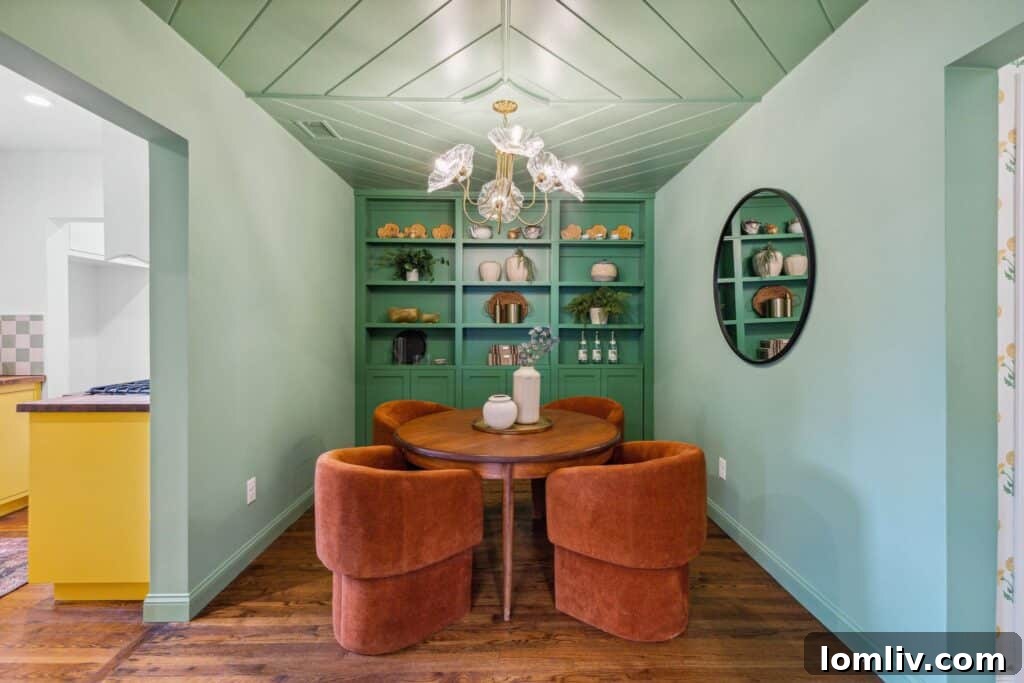 A tastefully designed hallway or transition area within the renovated Oak Cliff home, demonstrating the preservation of its original architectural footprint.