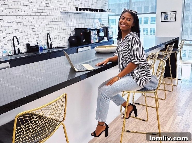 Loren Hall smiling in a professional setting
