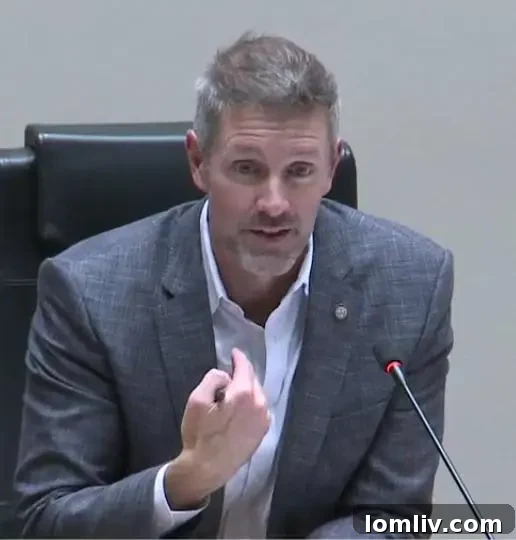 Councilman Chad West speaking at a public event, advocating for progressive housing solutions in Dallas.
