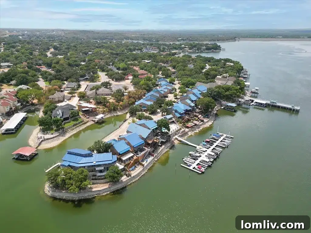 Expansive private dock and boat house, indicating direct and superior access to Eagle Mountain Lake for a large vessel.