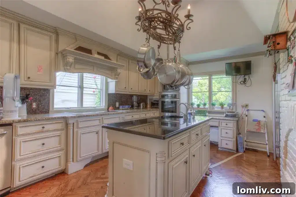 A large, well-appointed kitchen with professional-grade appliances, suitable for catering grand events or family meals.