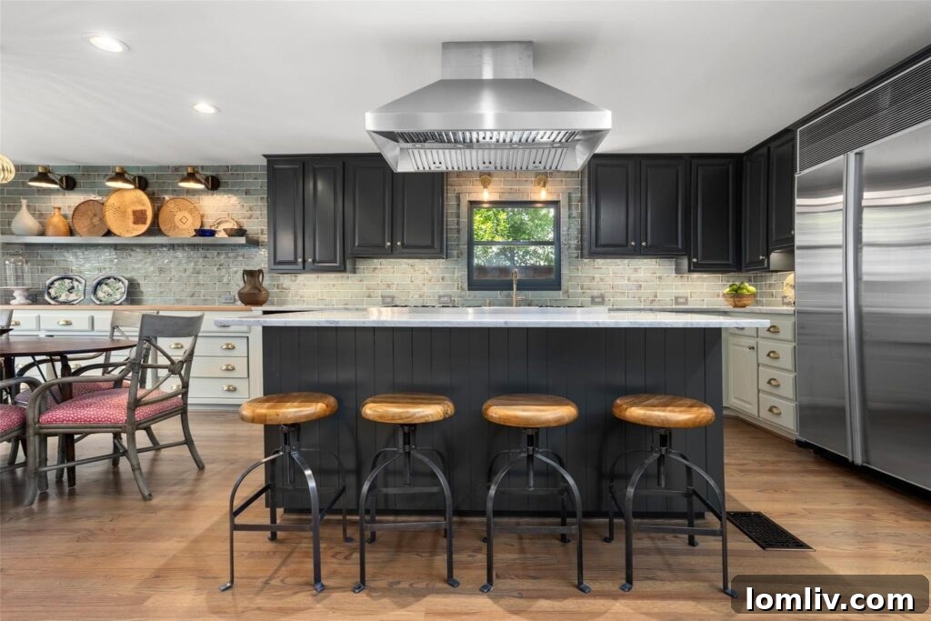 Rare Midcentury Gem in Rivercrest First Time Offered 7 State-of-the-art kitchen with a large gas cooktop and elegant finishes