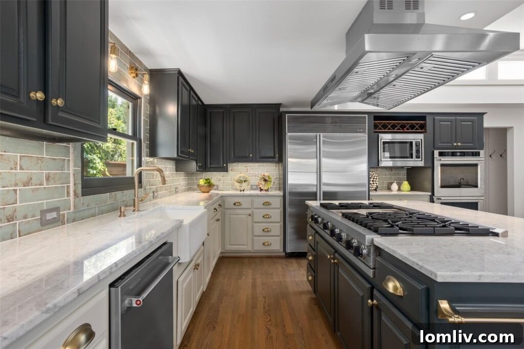 Rare Midcentury Gem in Rivercrest First Time Offered 8 Modern kitchen island with high-end appliances and stylish brass details