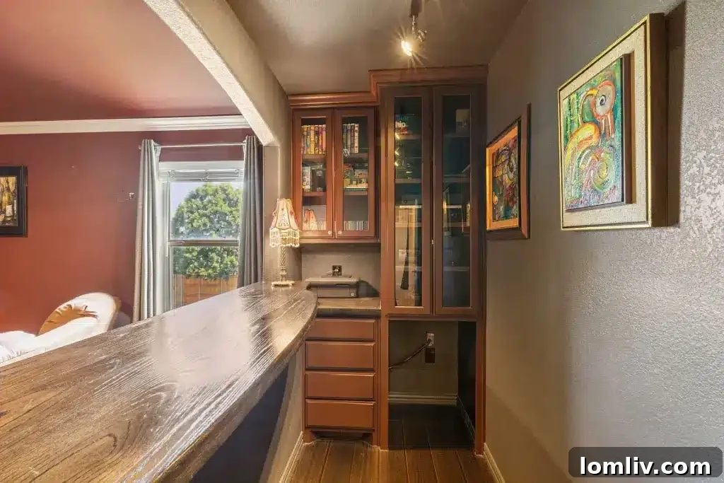 Laundry room with practical storage and counter space, designed for efficiency.