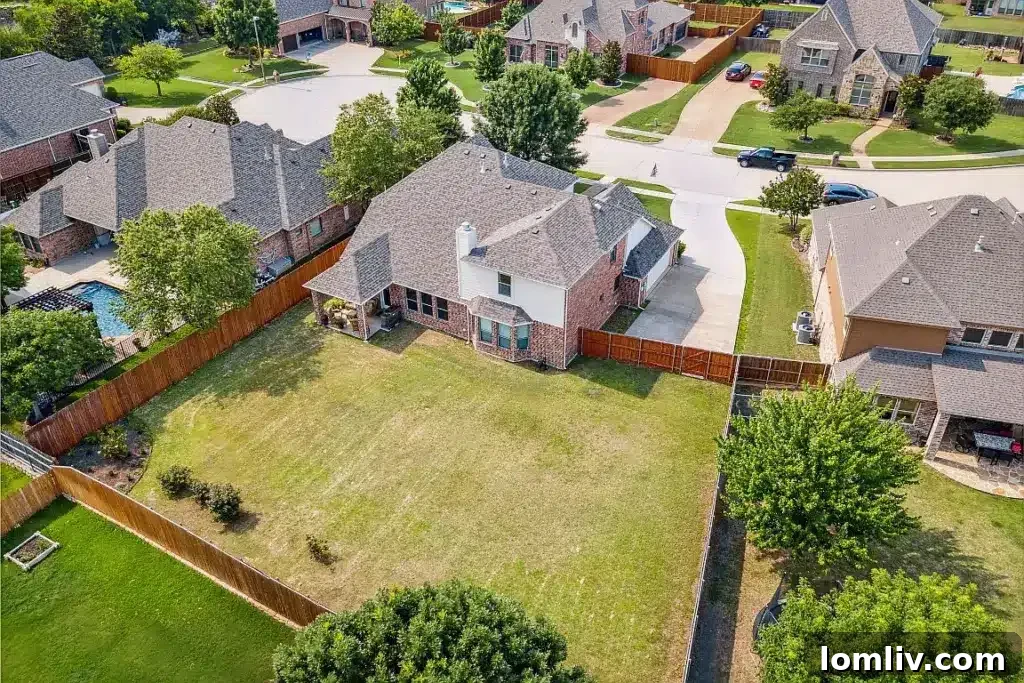 Spacious backyard with potential for landscaping and outdoor living enhancements, offering a private retreat.