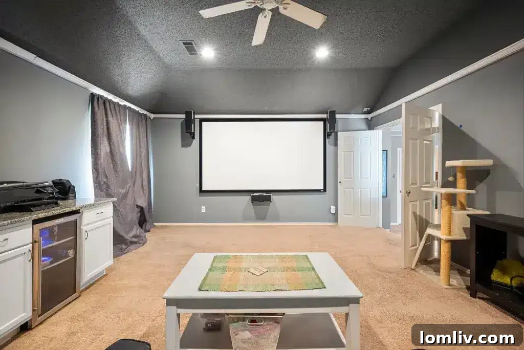 Expansive backyard featuring a sparkling swimming pool, a relaxing spa, and an extended patio for outdoor gatherings.