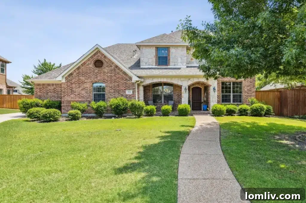 Exterior view of a custom-designed home on a quiet Sachse cul-de-sac, featuring manicured landscaping and an inviting entrance.