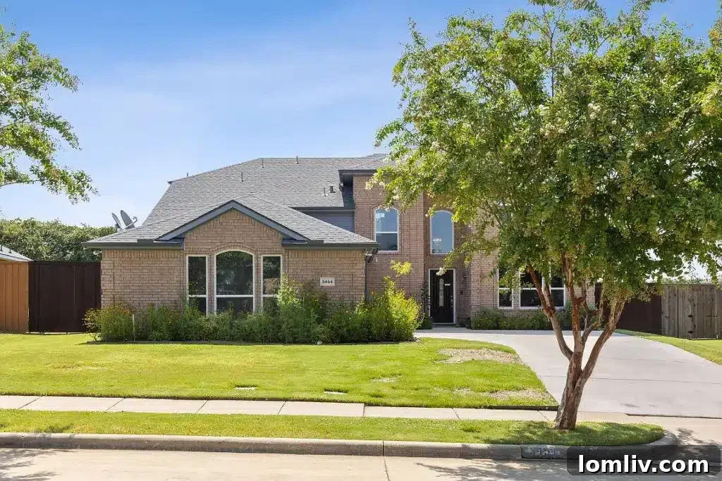 Charming front exterior of 3454 Annapolis Court in Sachse, TX, showcasing its well-maintained facade and welcoming appeal.