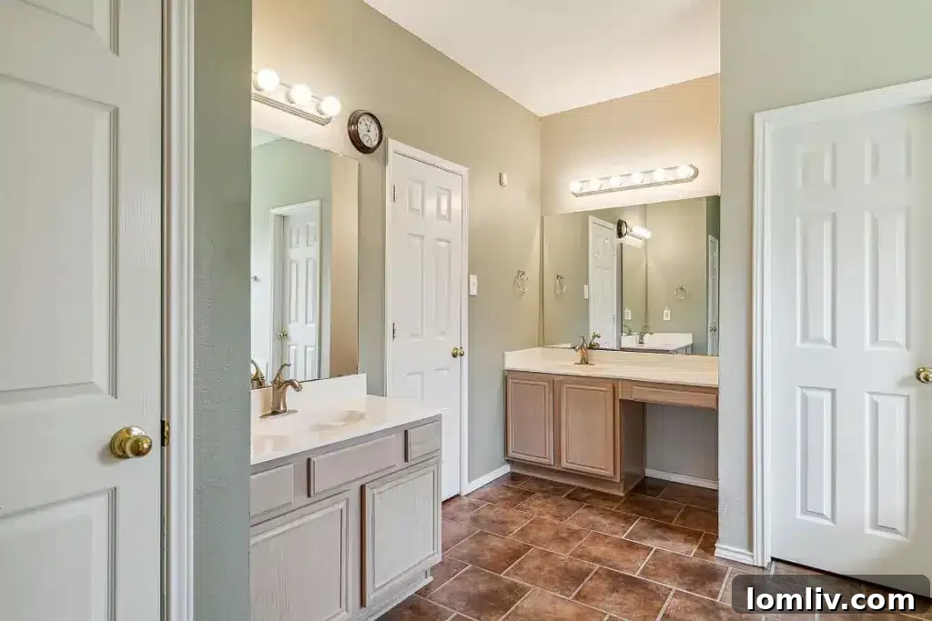 Comfortable primary bedroom located downstairs, offering a private and accessible retreat.