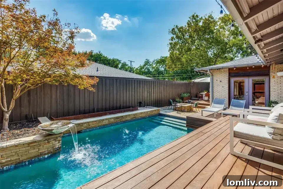 Rare East Dallas Ju-Nel Gem Hits The Market Open This Weekend 6 The stunning multi-level cedar deck leading to the pool and firepit area, creating a resort-like backyard.