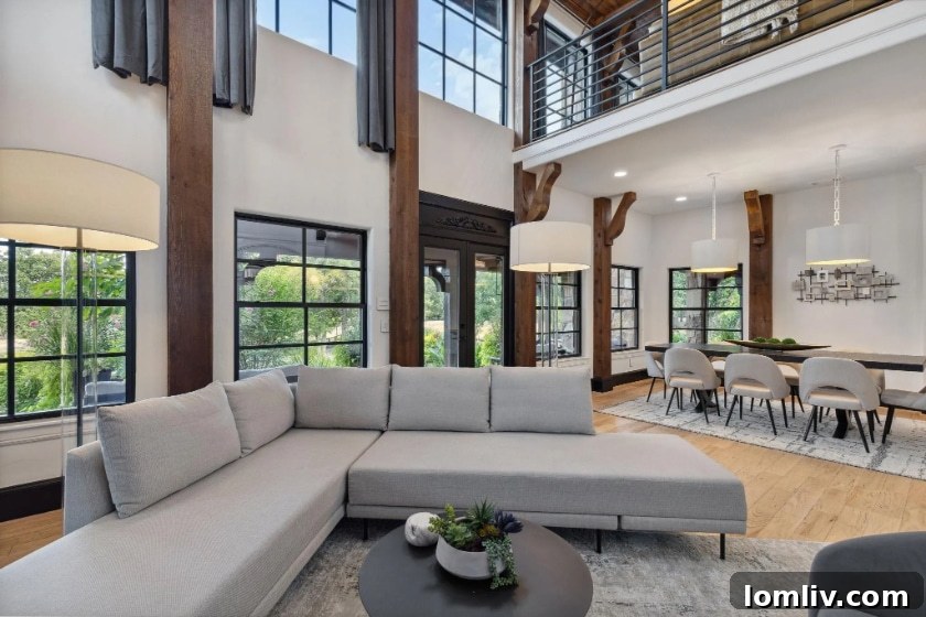 Spacious gourmet kitchen with a large island, modern appliances, and elegant cabinetry in an Argyle estate