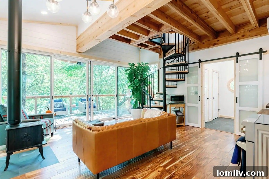 Annie Leibovitz's Retrospective: North Texas Realtors Flock to Bentonville 17 Interior of The Treehouse @ Whitehill & Pine, showing large windows and view