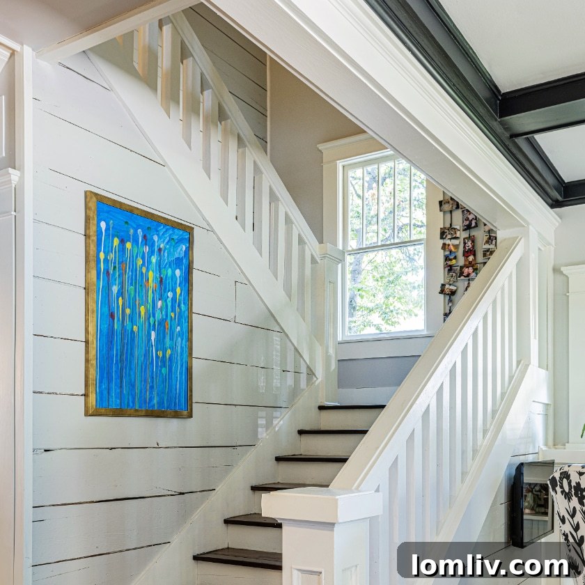 Heritage Oak Cliff: 2023 Home Tour of Historic Charm 7 A beautifully renovated interior showcasing a harmonious blend of old and new elements, creating an elegant ascension of design in a historic home.