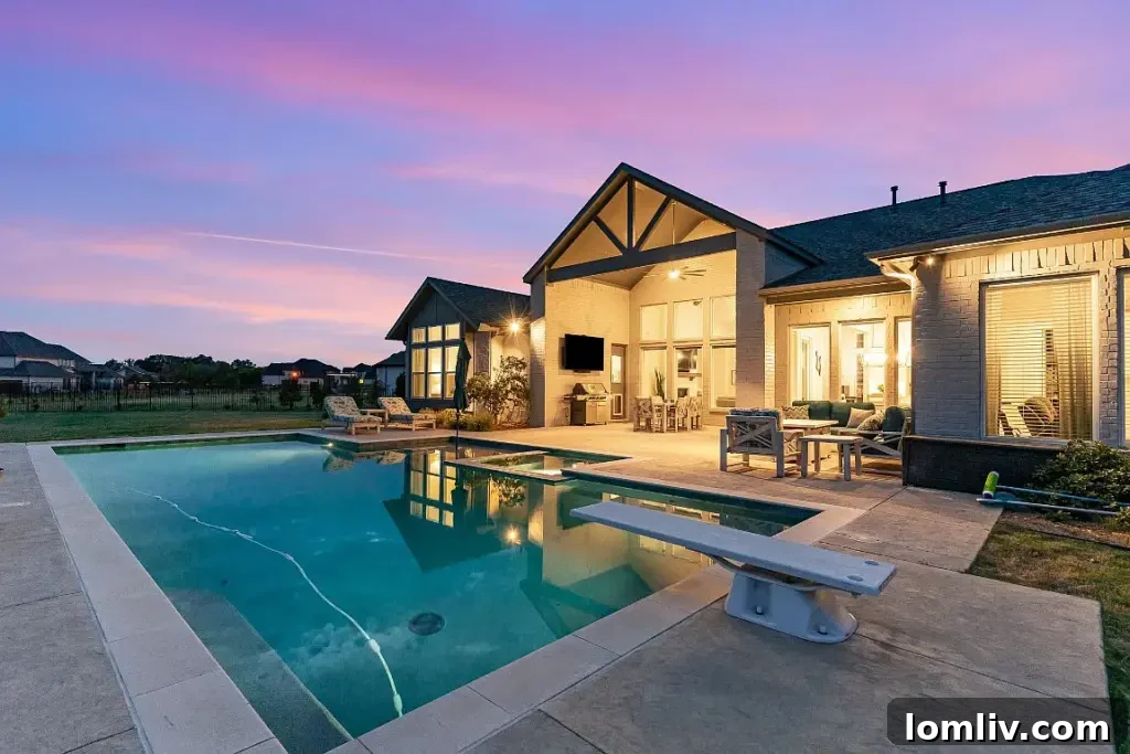 Aerial view showing the beautiful backyard and pool of 308 Claire Court, Sunnyvale, TX.