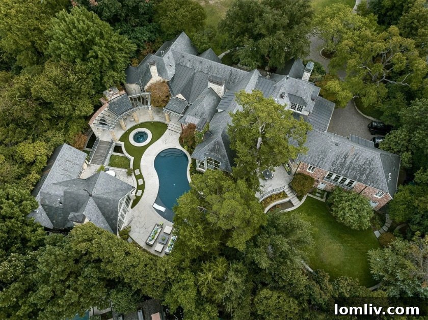 Expansive green lawns and mature trees on the Bluffview property