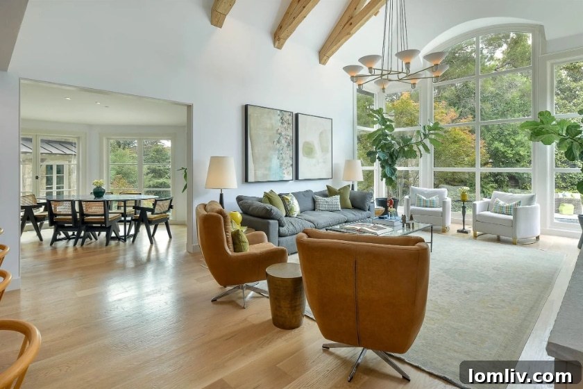Spacious living area with vaulted ceilings and natural light