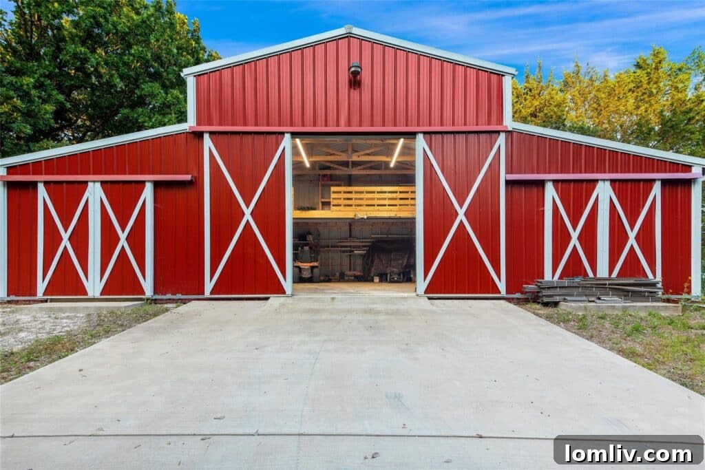Spacious Red Barn with Loft and Workshop on Wills Point Property