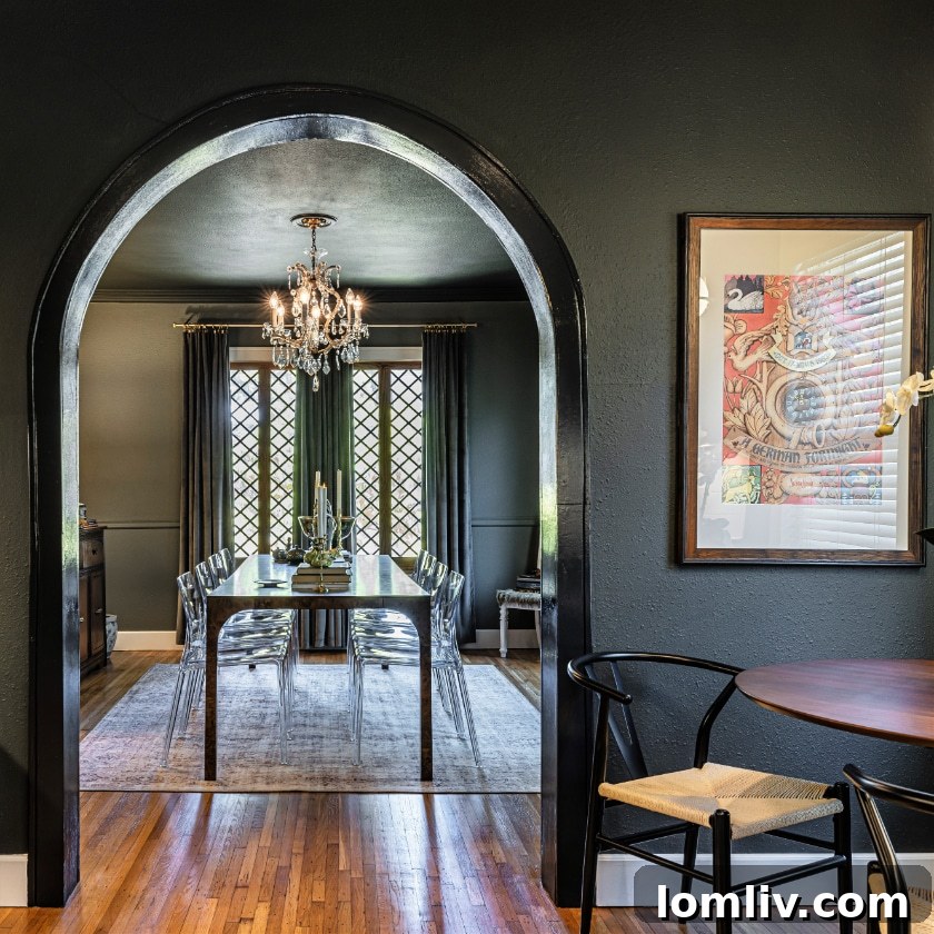 Natural sunlight illuminates and connects multiple living spaces within a historic home, highlighting warmth and openness.