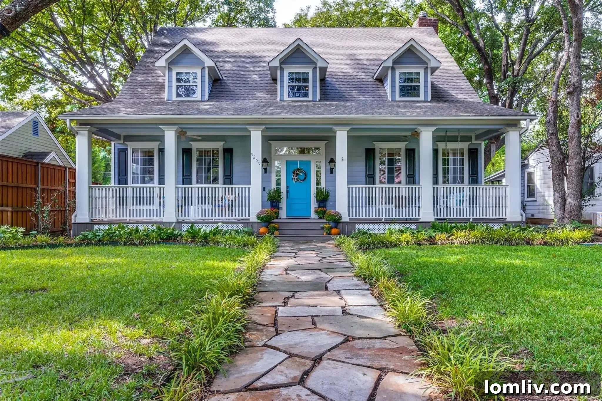 Snatch This Cape Cod-Style Home in The Peninsula Before I Do 2 Expansive front porch of a charming Cape Cod style home in Dallas.