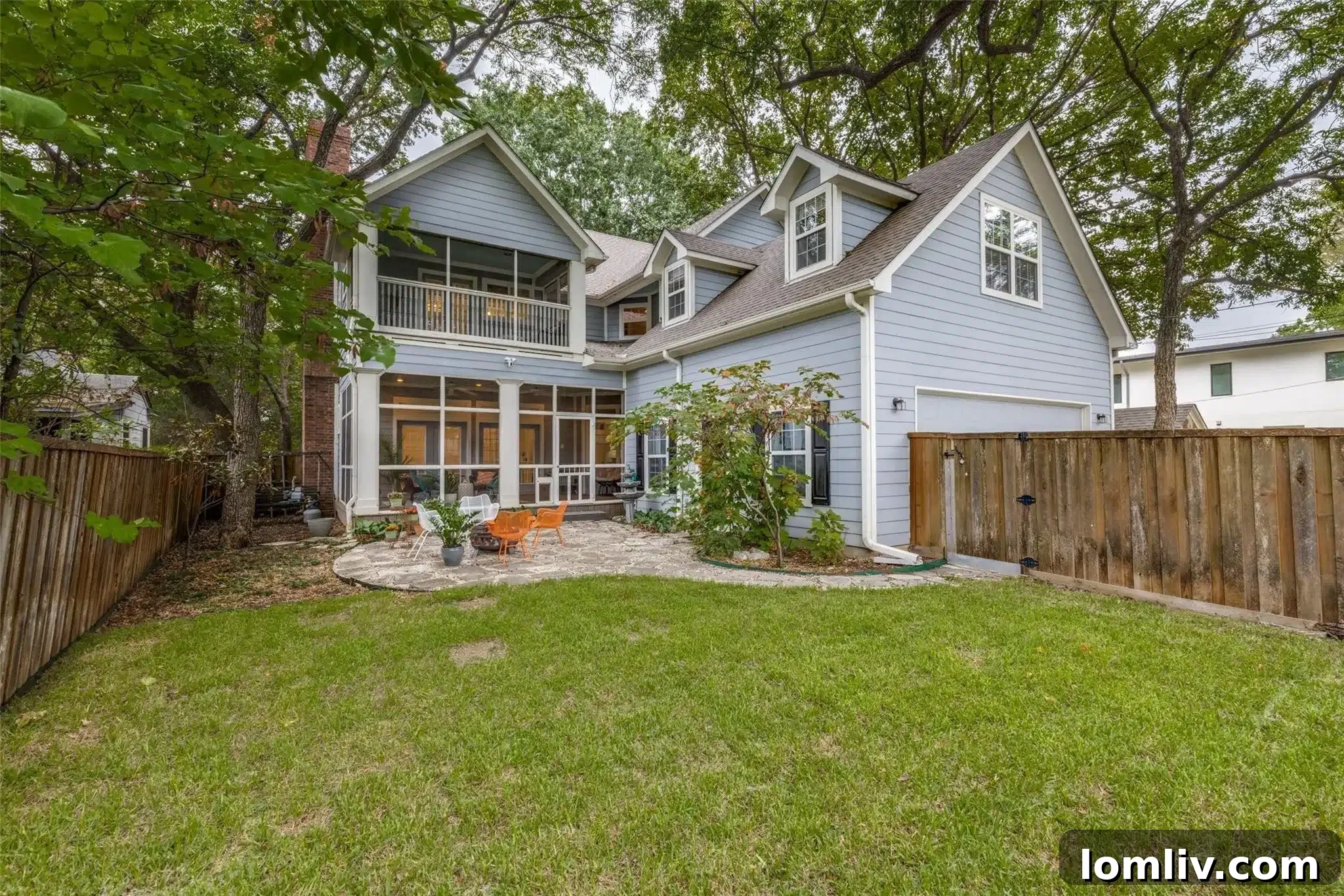Snatch This Cape Cod-Style Home in The Peninsula Before I Do 7 Another view of the spacious screened porch, ideal for relaxation.