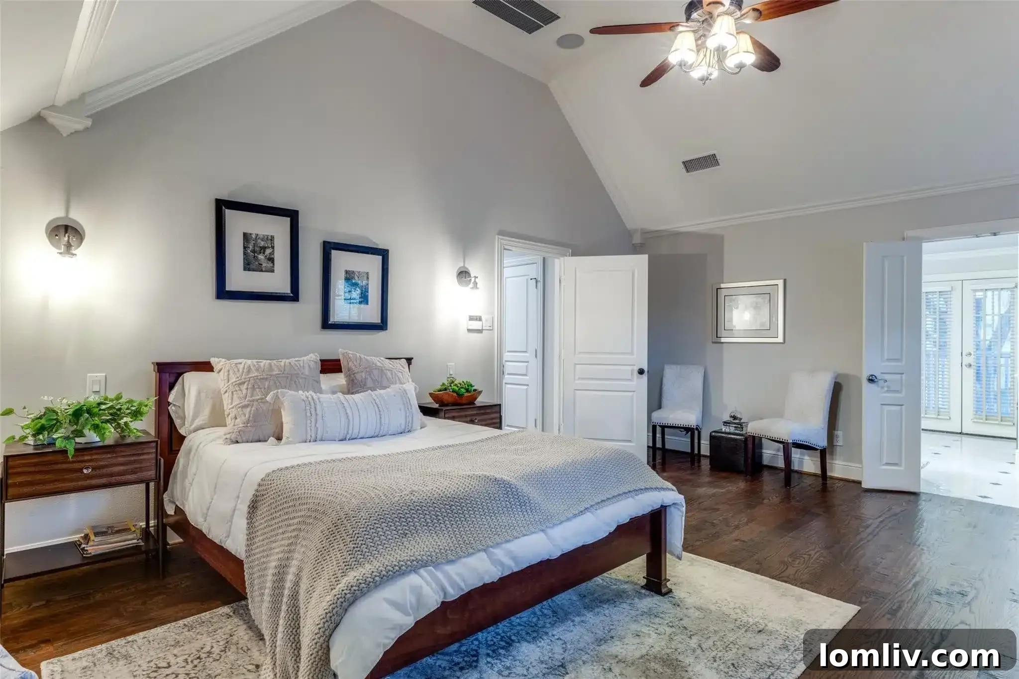 Snatch This Cape Cod-Style Home in The Peninsula Before I Do 8 Elegant primary bedroom with access to a private screened porch.