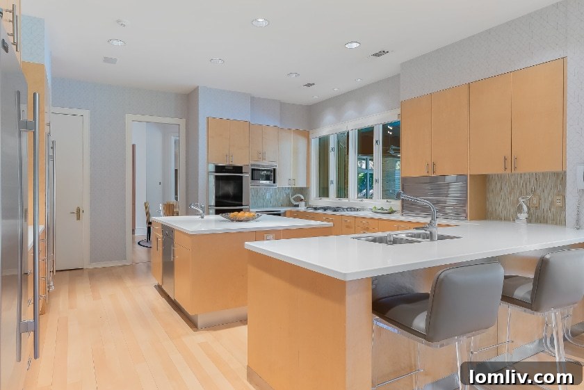 Luxurious primary bathroom with high-end finishes, dual vanities, and a freestanding tub, offering a spa-like experience.