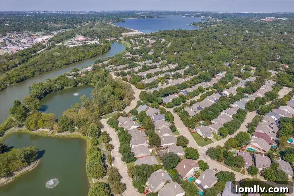 Holiday Shopping Head Start: Tour This Enclave at White Rock Home This Weekend 3 Aerial view of the serene community ponds and lush green spaces in Enclave at White Rock.