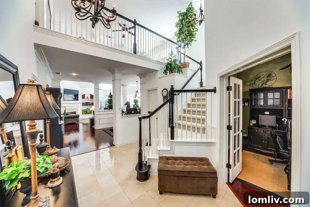 Holiday Shopping Head Start: Tour This Enclave at White Rock Home This Weekend 4 Front exterior of a luxury home showcasing beautiful brick and stonework.