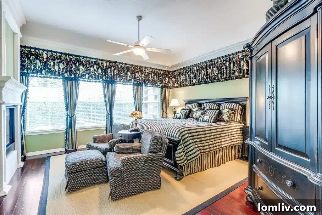 Holiday Shopping Head Start: Tour This Enclave at White Rock Home This Weekend 8 Spacious primary bedroom featuring a cozy fireplace and elegant furnishings.