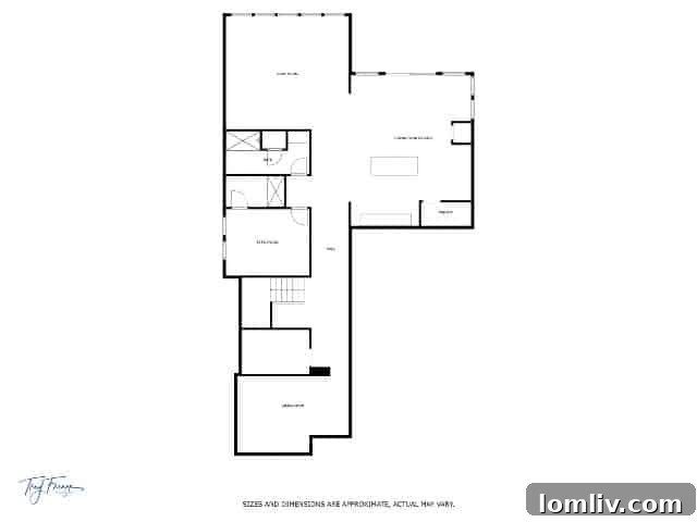 Versatile lower level space in the walk-out basement of the Fort Worth home, perfect for entertainment or an in-law suite, with direct outdoor access